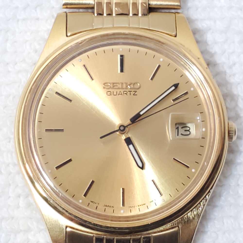 Vintage 1990's Seiko Gold Tone Men’s Date Analog Quartz Watch VERY CLEAN